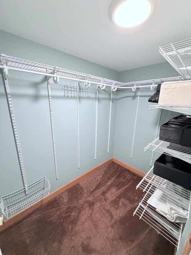 Building Photo - Spacious 4-Bedroom Home with Pond Views & EV-Ready Garage – Bloomington!!