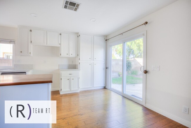 Building Photo - A Captivating and Charming 2 Story Home Ne...
