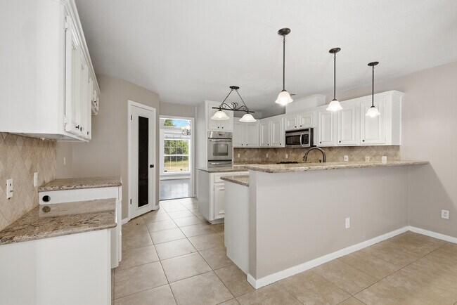 Building Photo - 905 Winged Foot Dr