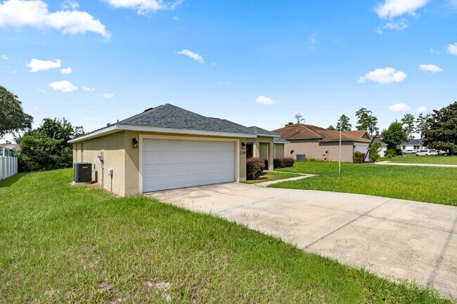 Building Photo - Newer 3BR Home on Nearly 1/4 Acre | Screened Lanai | Available Now!