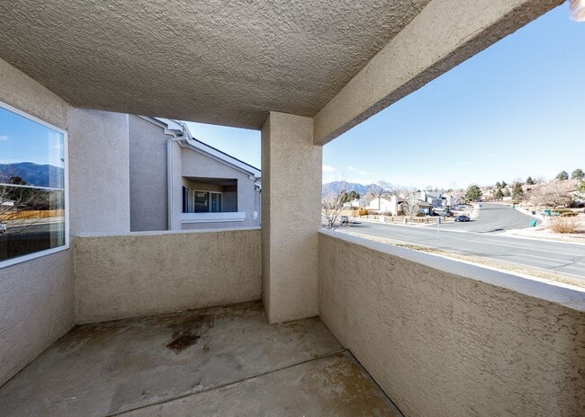Building Photo - 3 Bed Top Floor Condo near Ft. Carson in Gated Community with detached Garage