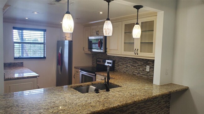 Building Photo - 10110 Boca Entrada Blvd