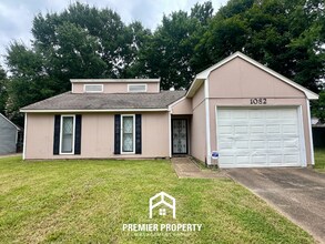 Building Photo - 3BR/2BA Memphis Rental with 1-Car Garage, Brick Fireplace & Spacious Fenced Yard