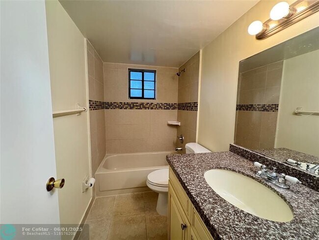 Building Photo - 12222 Royal Palm Blvd