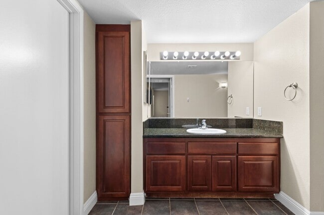 Building Photo - SE!!! Gated!! 1 Bedroom 1st Floor!! One Car Garage!!! Community Pool, Spa, Clubhouse!!! All tile ...
