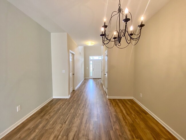 Building Photo - Spacious, Four Bedroom Townhouse With a View!