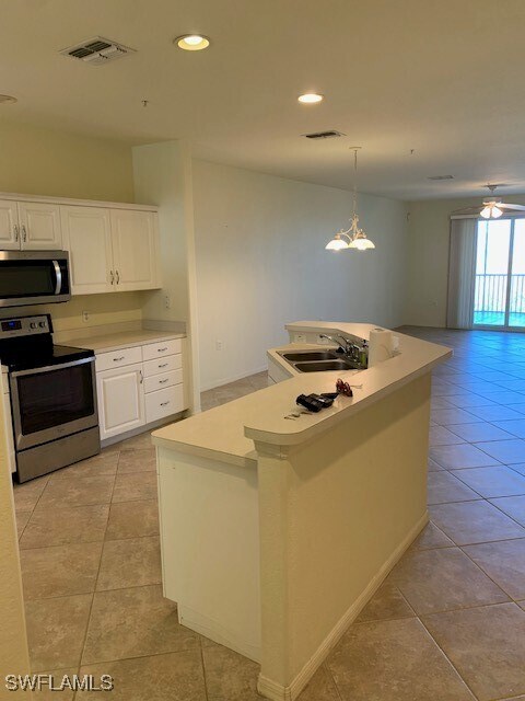 Building Photo - 20031 Sanibel View Cir