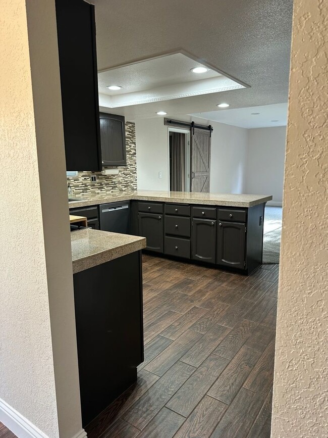 Building Photo - Beautifully maintained home in a peaceful setting