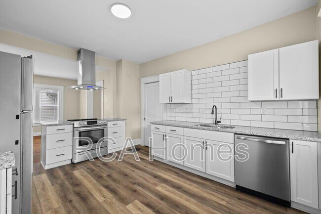 Building Photo - 3227 Guilford Ave