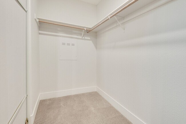 Building Photo - FULLY FURNISHED! Exudes sophistication with designer touches throughout