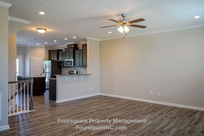 Building Photo - Modern 3-Story Townhome with Entry-Level Bonus Room, Back Deck & Garage , Community Pool in North...