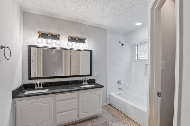 Building Photo - Welcome to this stunningly updated, three-bedroom, two-bath home located in the desirable Valley ...