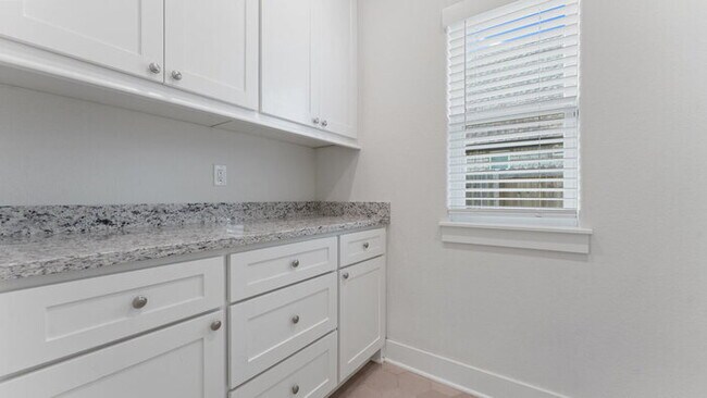 Building Photo - "Lovely 4-Bedroom Retreat with Fireplace &...