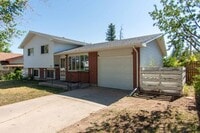 Building Photo - 6921 Manhattan Ln