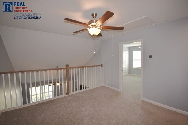 Building Photo - Gorgeous end unit 2 bedroom townhouse with garage! PLUS Loft!