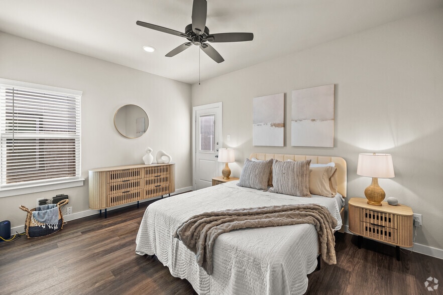 2BR, 2BA - 883SF - Primary Bedroom - Cottages at Deer Creek