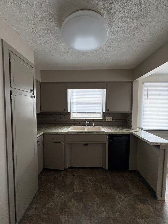 Building Photo - Three bedroom two bathroom single story home for rent