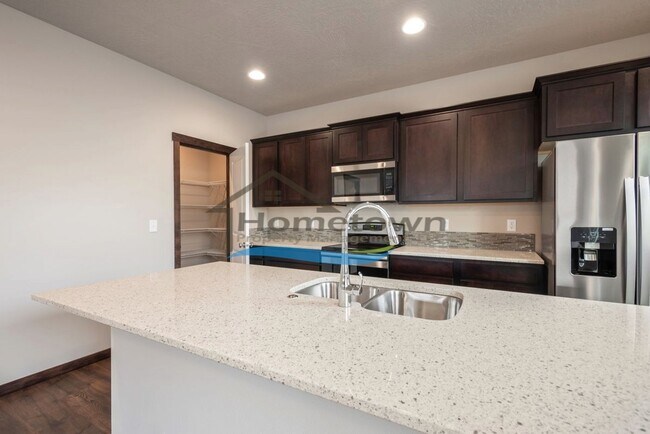 Building Photo - Woodbridge South Home with 4 Bedrooms and 3 Bathrooms in Post Falls build in 2021!