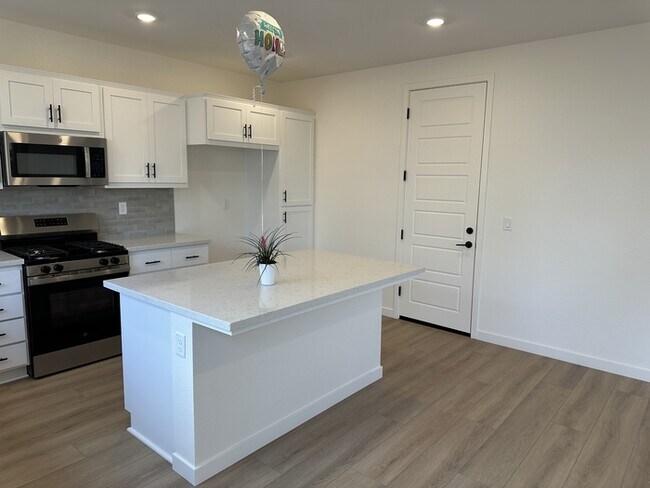 Building Photo - Come Tour This Beautiful Brand New 4-Bedro...