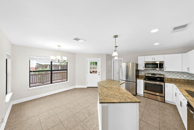 Building Photo - Spacious & Thoughtfully Updated 4-Bedroom ...