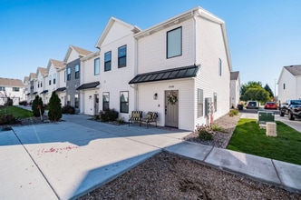 Building Photo - AWESOME END UNIT with attached 2 stall garage and additional personal parking spot on the exterior