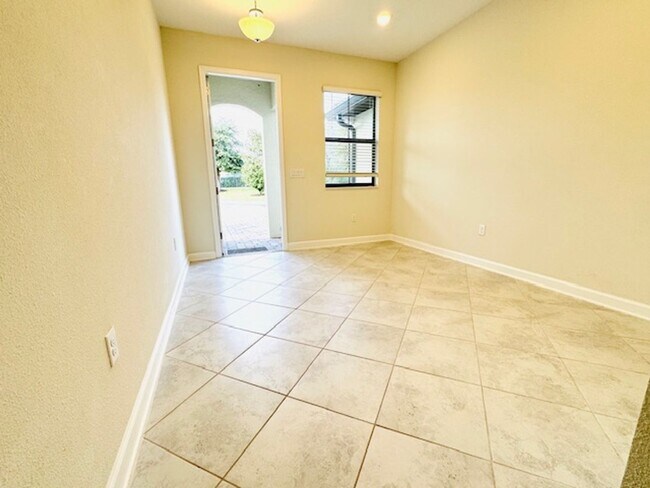 Building Photo - For Rent in ChampionsGate 3/2.5 Townhouse with Water View