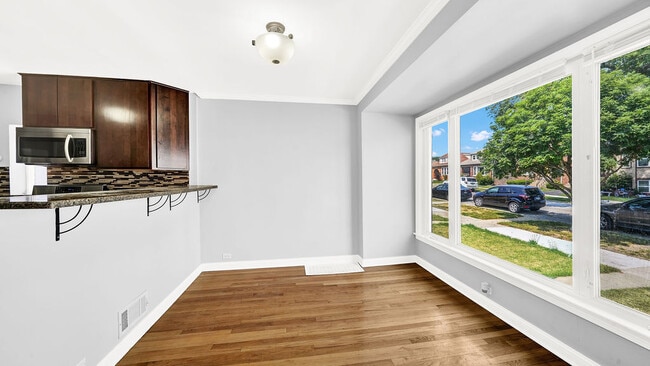 Building Photo - 5542 S Neva Ave