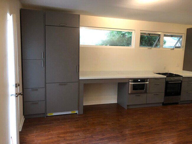 Modern kitchen with pantry storage - 4360 Stewart Ave