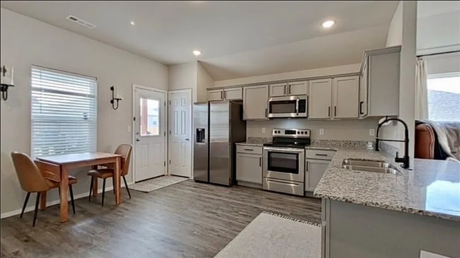 Building Photo - Stylish 3 Bed / 2 Bath with Open Layout & Backyard Retreat