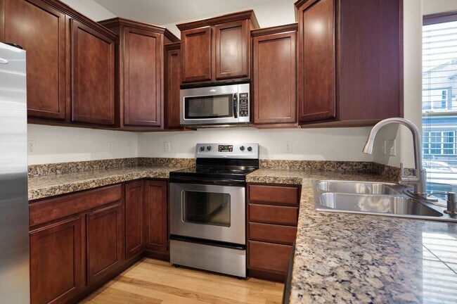 Building Photo - Beautiful 2 bdrm end unit with attach 2 car garage