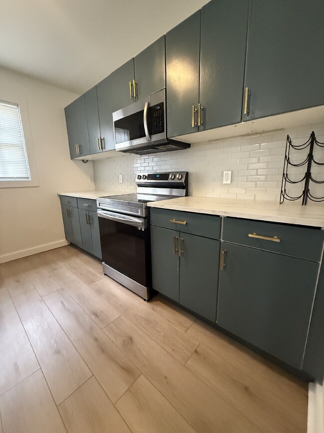 Building Photo - SECTION 8 WELCOME - "Charming and Spacious...