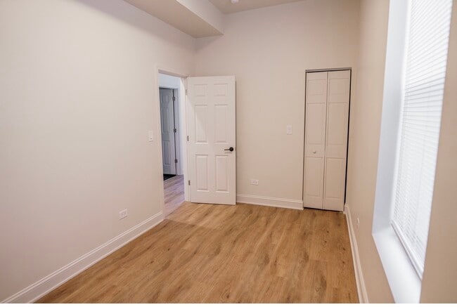Building Photo - 6613 S Vernon Ave