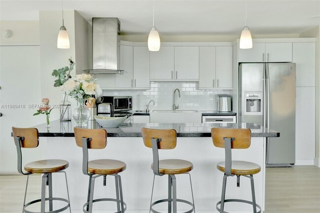 Building Photo - 7135 Collins Ave