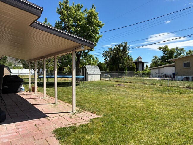 Building Photo - Beautifully remodeled home with central air, 1 car garage, RV parking and covered patio