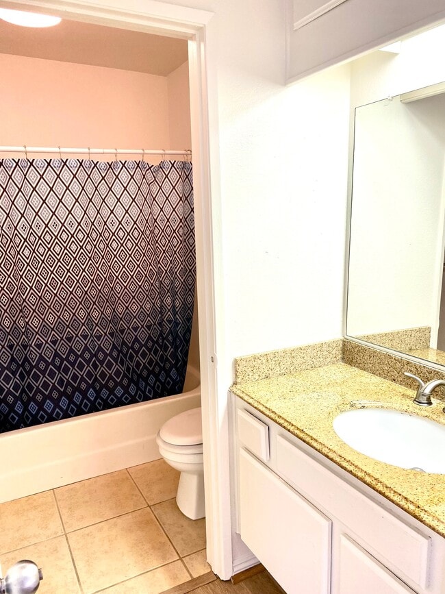 bathroom 1 sink and shower - 8463 De Soto Ave