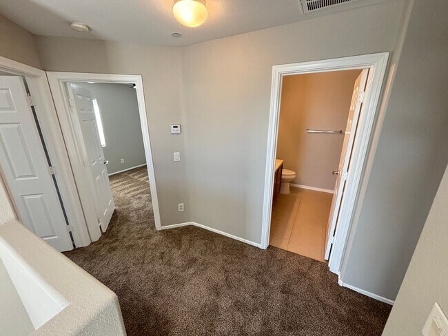 Building Photo - Spacious Tri-Level 4-Bedroom Home with Balcony and Community Amenities in Northwest Las Vegas!