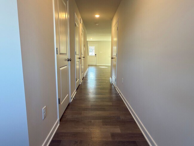 Building Photo - Modern New 3BR Townhome in Hancock Village with Luxury Finishes