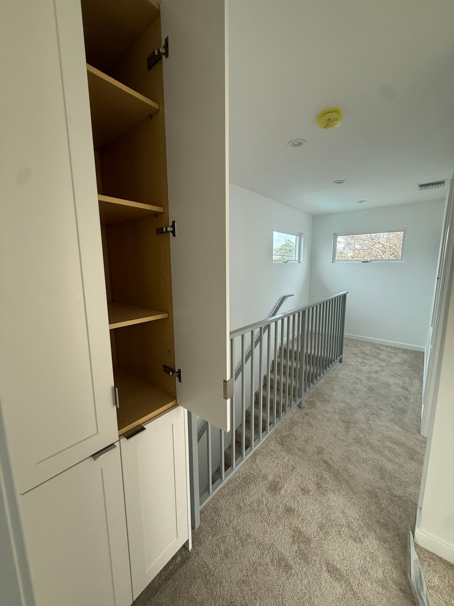 2nd floor landing with linen closet - 6259 Riverton Ave