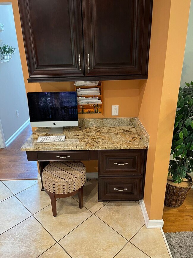 Building Photo - Updated & Landscaped 4 Bedroom, 4 Bath Hom...