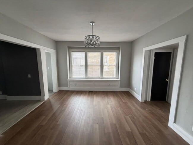 Building Photo - Charming 4-bed, 2-bath brick colonial home Contact KPM Detroit 313-429-3244