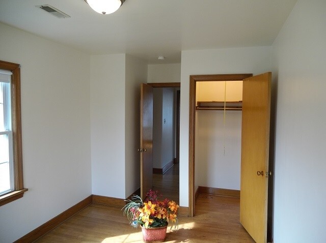 East bedroom adjacent to bath. Approx. size: 12'8" x 8'7" - 742 E Ford Ave