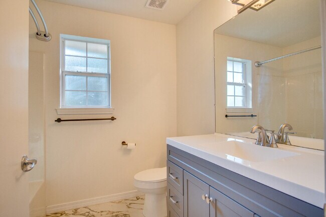 Building Photo - West Pensacola 3BR, 2BA Brick Home Near NAS Pensacola with Screened Porch, Spacious Kitchen & Ope...
