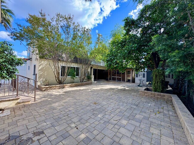 Building Photo - Peaceful North Hollywood street, charming three-bedroom, three-bathroom residence