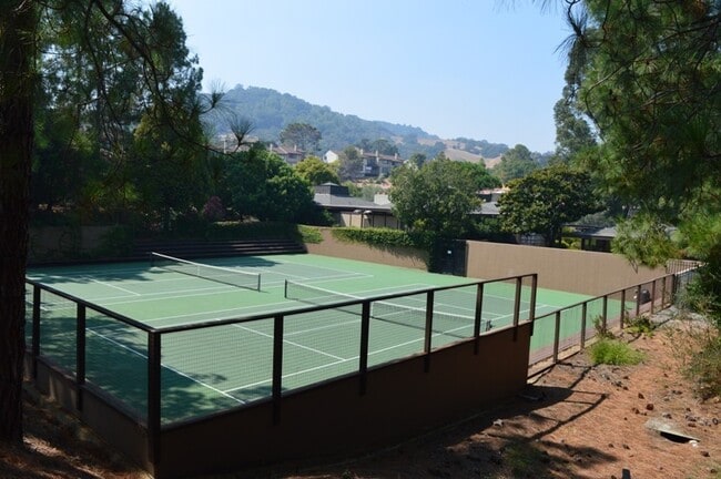 Building Photo - Light-Filled, Thoughtfully Updated Condo with Private Patio & Resort Amenities