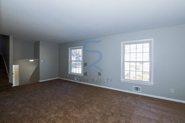 Building Photo - Move in before January 31st and choose your reward: a $250 Amazon Gift Card or a 55" Smart TV!