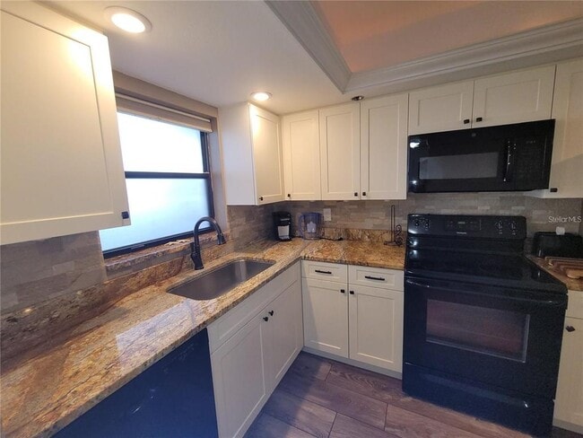 Building Photo - 104 Capri Isles Blvd