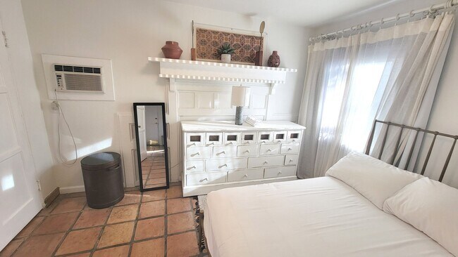 Building Photo - Charming, Fully Furnished Spanish-Style Du...