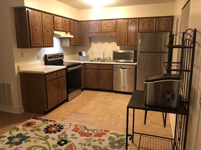 Stainless steel appliances in kitchen - 101 Michael Dr