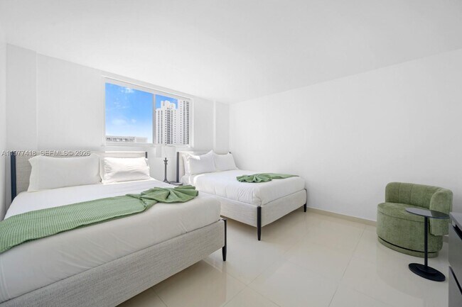 Building Photo - 19370 Collins Ave