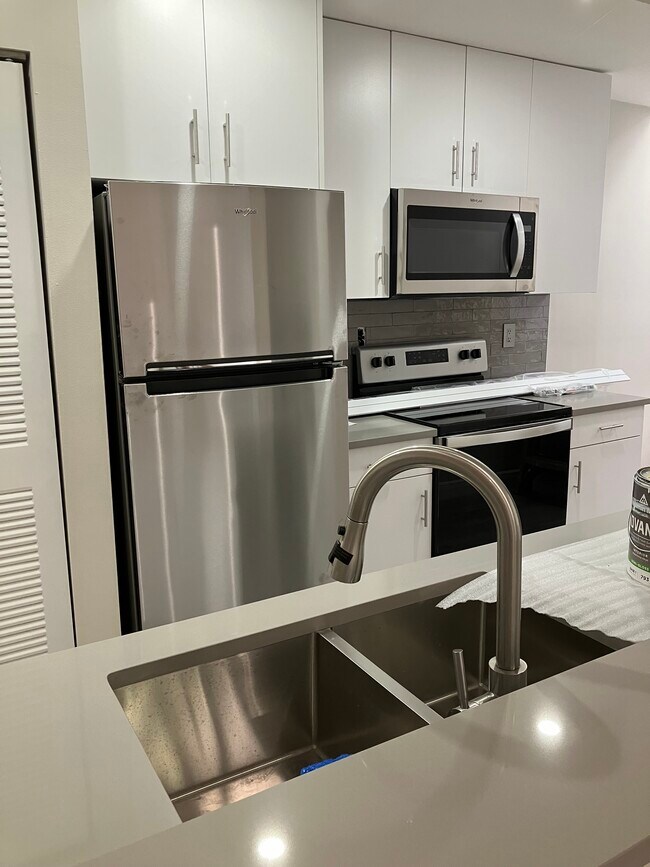 Kitchen with all new stainless appliances - 8042 NW 15th Mnr